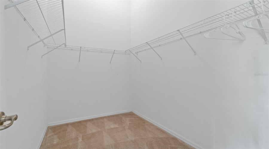 Primary Bedroom walk-in closet