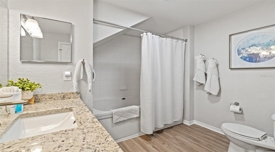 Granite vanity top and whirlpool tub/shower
