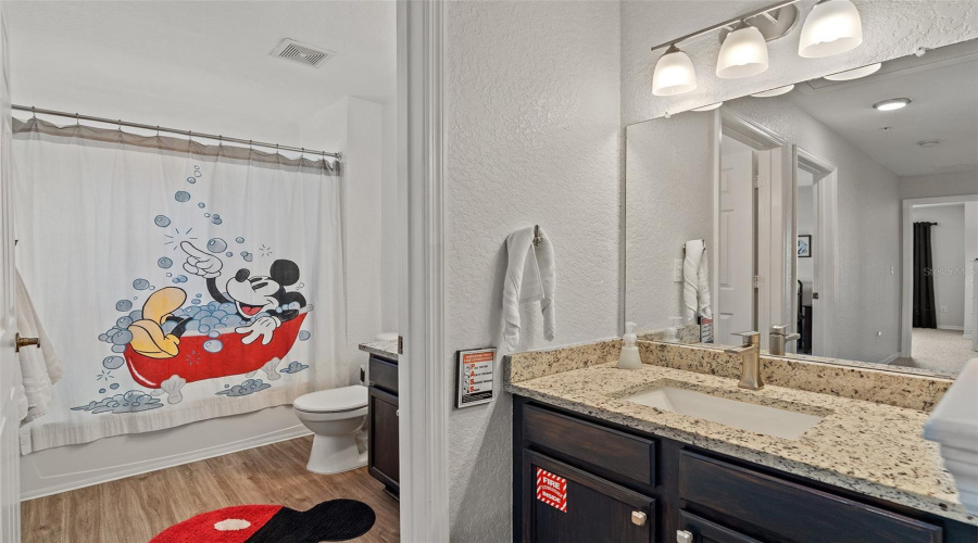 Second floor 2nd bathroom with split vanity sinks