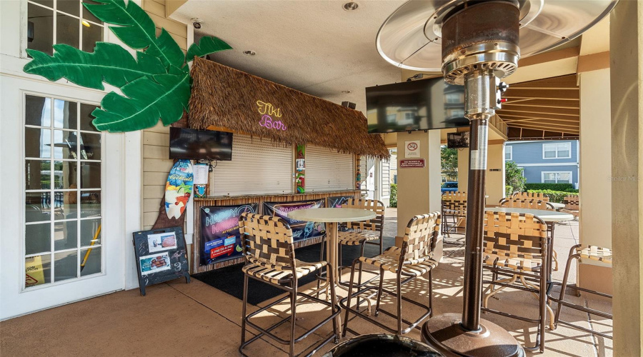 Enjoy a refreshing beverage at the tiki area