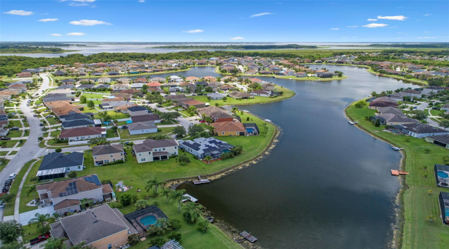 Aerial of home looking generally south with Lake Toho in the distance