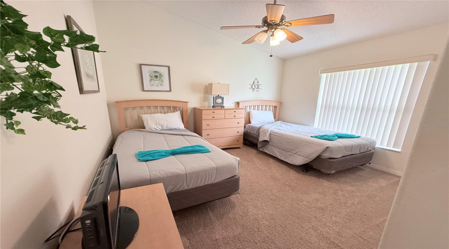 Blue Bedroom with 2 single beds and flatscreen TV