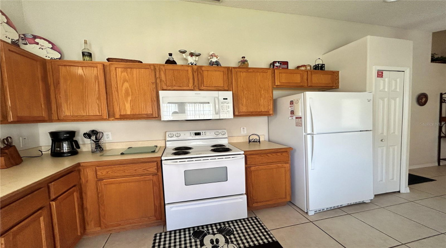 White Appliances include Range, Microwave, Refrigerator and Dishwasher