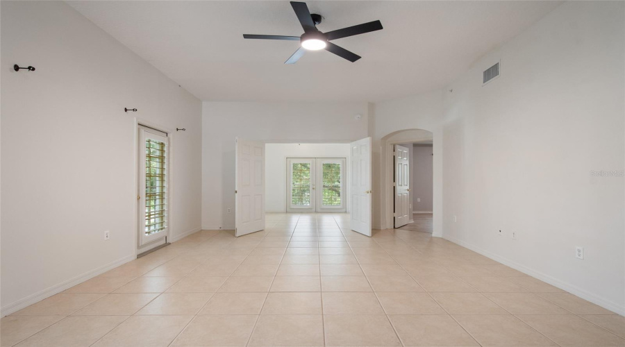 Beyond the Great Room is the 3rd bedroom and to the right is the Owner's Suite