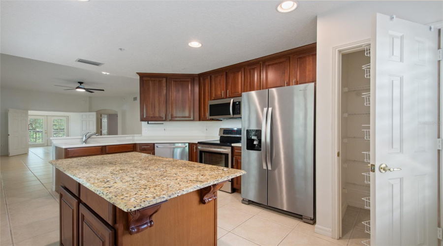 Good size pantry and extra cabinet space in the Island.