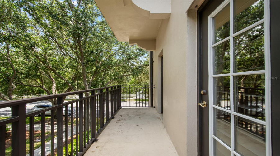Side balcony also has view of the pond across the street.