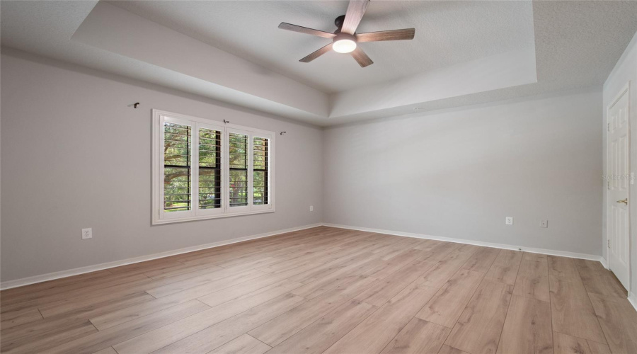 Owner's Bedroom with brand new Luxury Vinyl Flooring