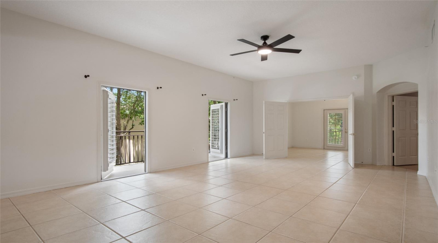 Spacious and bright Great Room has two doors leading to the large balcony