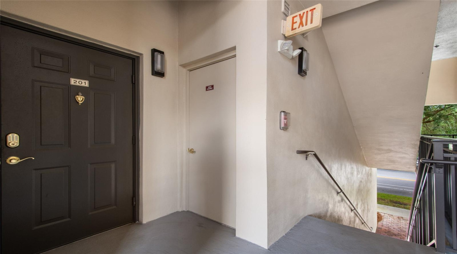 Flight of stairs is right by the unit, but there is an elevator in the building.