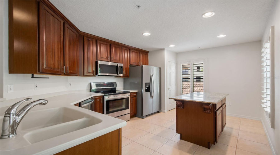 Corian Counter tops and Granite on the Island