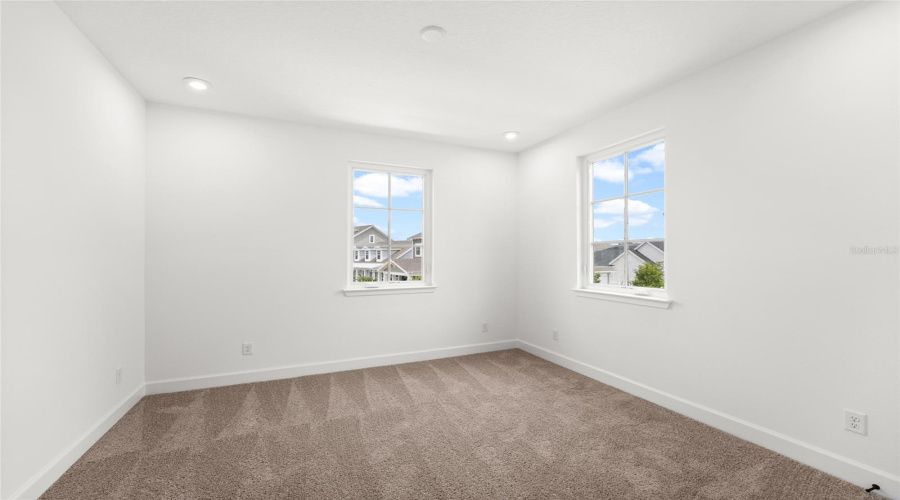 Bedroom 3  features direct access to a Jack and Jill bathroom, shared with an adjacent room.