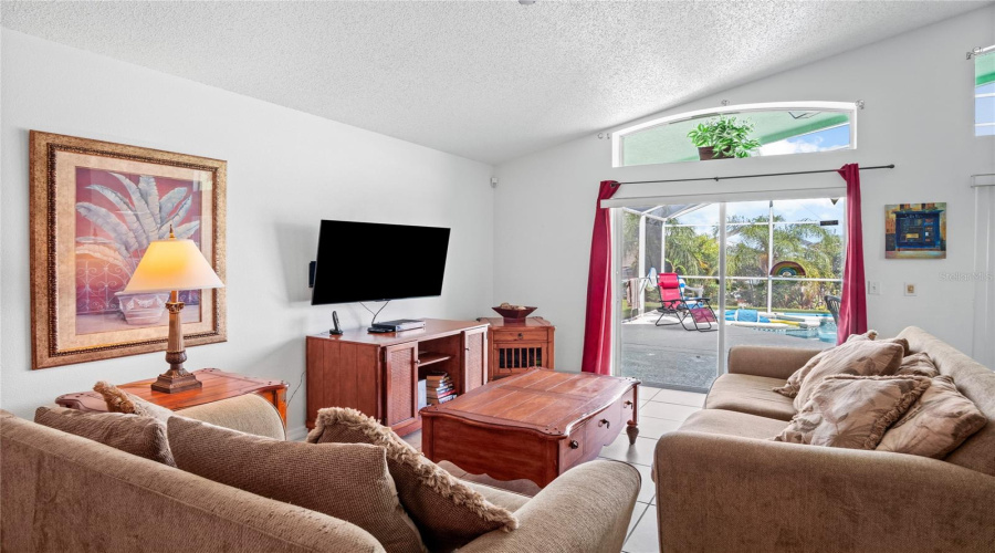 The family room looking toward the sliding glass doors that take you to the lanai and pool.