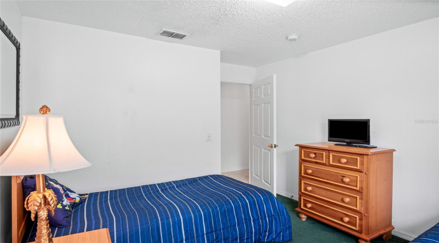 Another view of the guest bedroom looking out to the hallway.