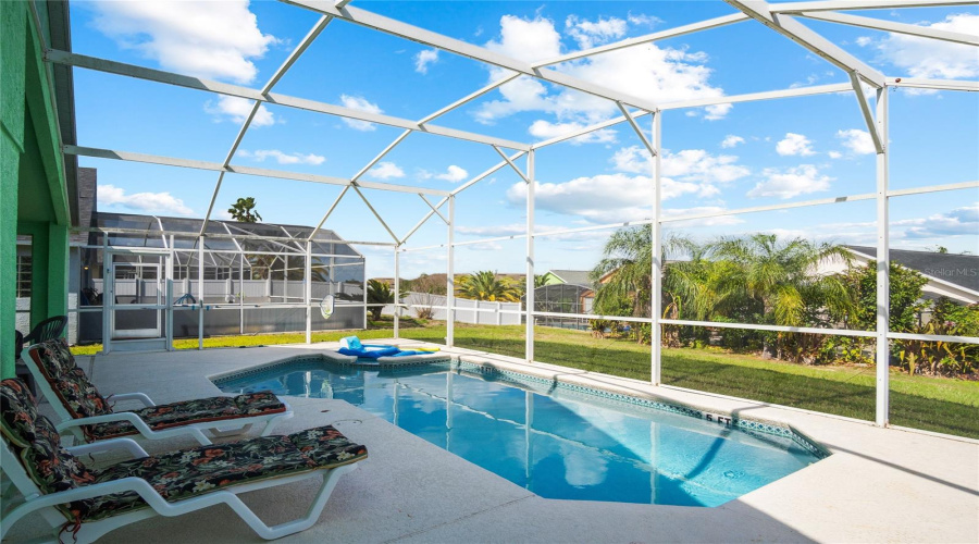 Enjoy a sunny day in Florida out by the pool.
