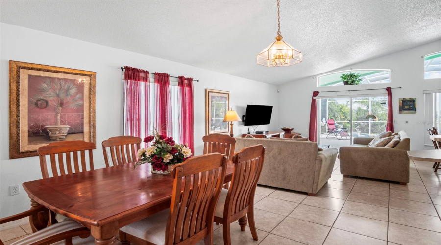 Plenty of natural light with the windows and sliding glass door.