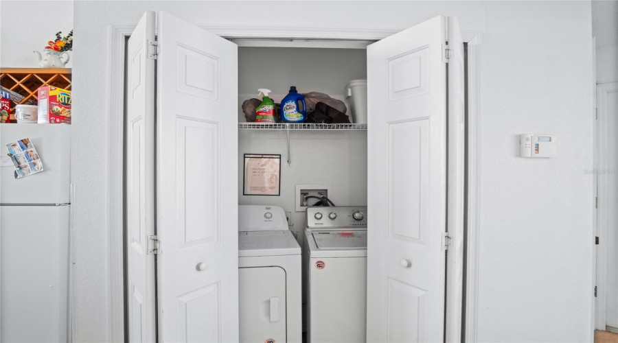 The laundry area is convenient located between all of the bedrooms.