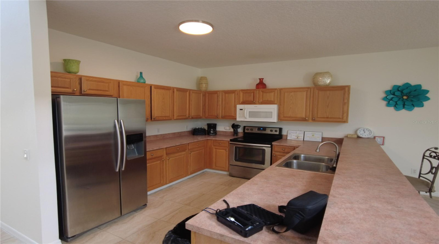KISSIMMEE, Florida 34746, 5 Bedrooms Bedrooms, ,3 BathroomsBathrooms,Residential,For Sale,CUMBRIAN LAKES,0,MFRS5130830