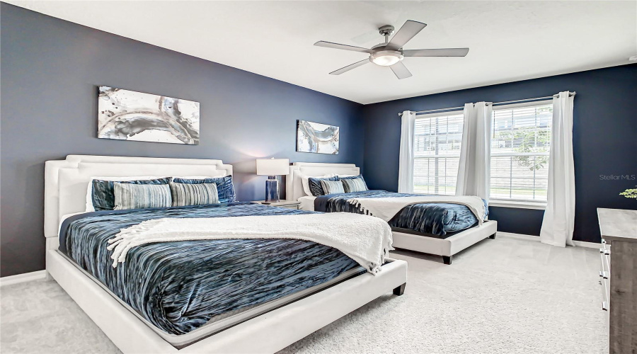 Bed #3--Spacious setup with two king beds and a big-screen TV