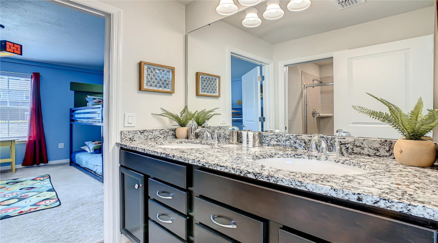 Bath #4--Jack-and-Jill bathroom with dual vanities connecting the Pooh and Mario