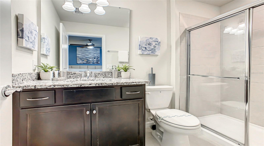 Bath #5--This modern full bathroom offering both privacy and style