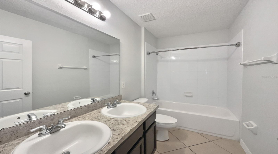 DAVENPORT, Florida 33837, 4 Bedrooms Bedrooms, ,2 BathroomsBathrooms,Residential,For Sale,WHISPERING PINES,0,MFRO6327385