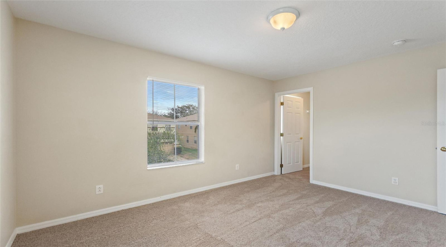 Third bedroom with walk in closet