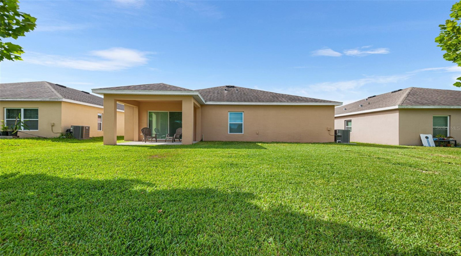 REAR VIEW OF PROPERTY. NOTE COVERED LANAI