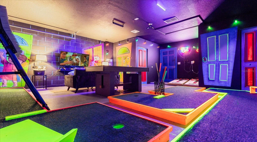Custom play room with Xbox and karaoke , air-hockey table and karaoke machine , mini golf