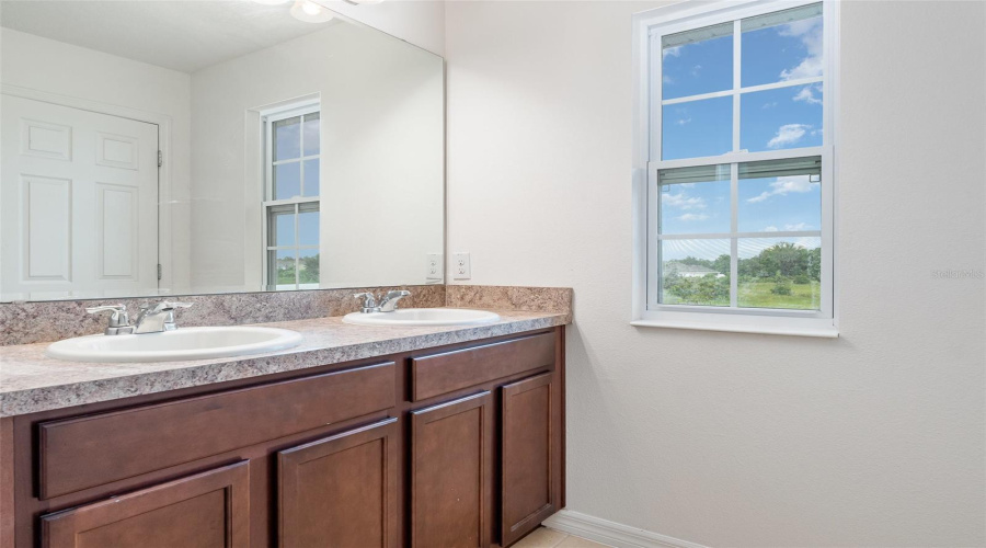 DAVENPORT, Florida 33837, 4 Bedrooms Bedrooms, ,3 BathroomsBathrooms,Residential,For Sale,PRIMROSE,0,MFRTB8408878