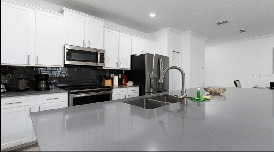 DAVENPORT, Florida 33896, 4 Bedrooms Bedrooms, ,3 BathroomsBathrooms,Residential,For Sale,SPLASH SHOT,0,MFRO6321046