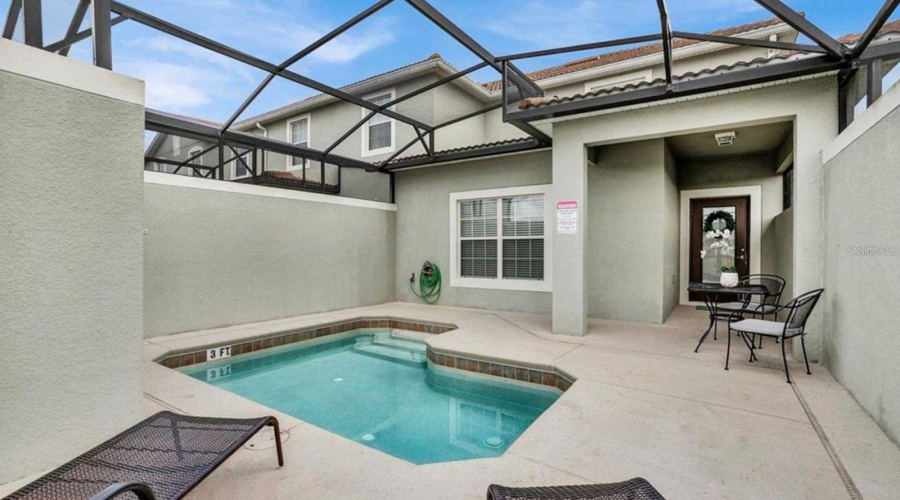 Private screened-in pool area