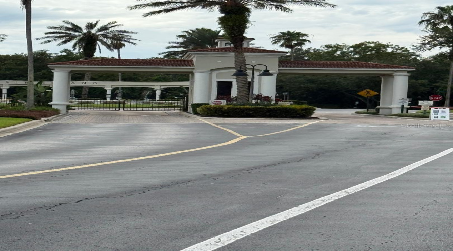 Man gated entrance to the larger section of the community