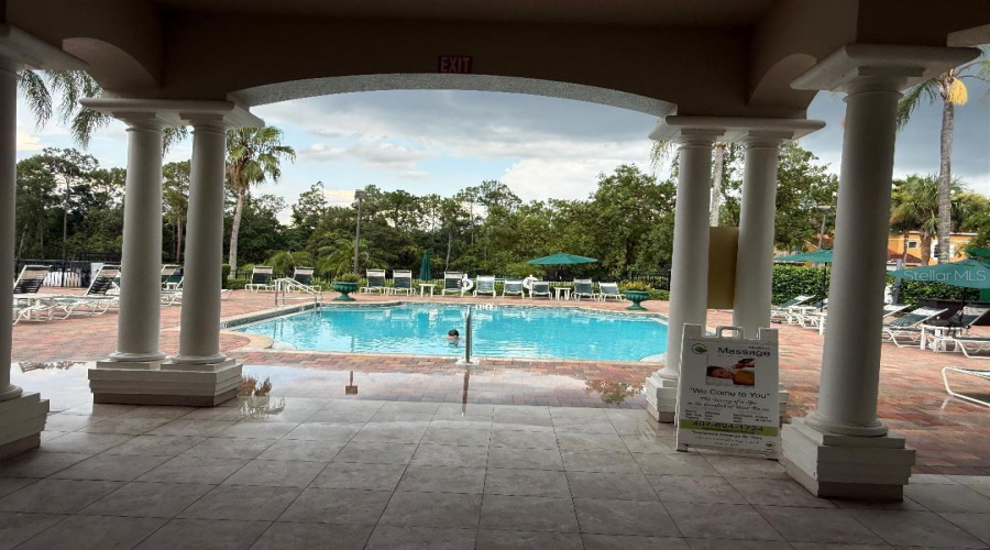 Exit clubhouse to community pool and its amenities