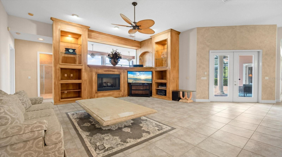 Family Room w/ Custom Cabinetry, Gas Fireplace, Surround sound with Subwoofer and Speakers