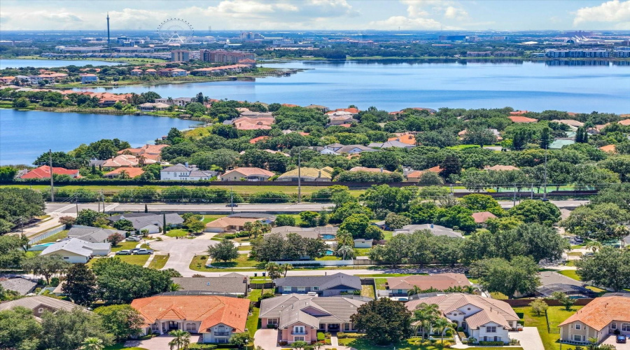 West view of Big Sand Lake and International Drive Hotels and Attractions including the Orlando Eye @ ICON Park