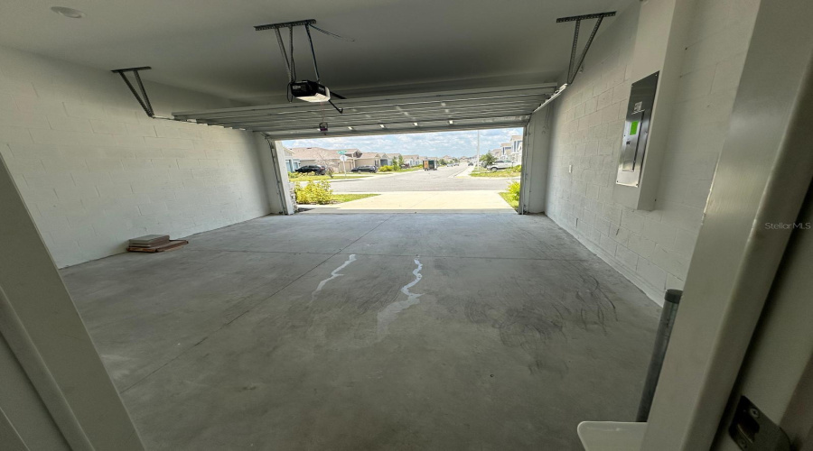 Garage for two cars inside and two cars outside.