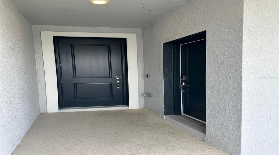 Independent entrance doors to the main house and annex.