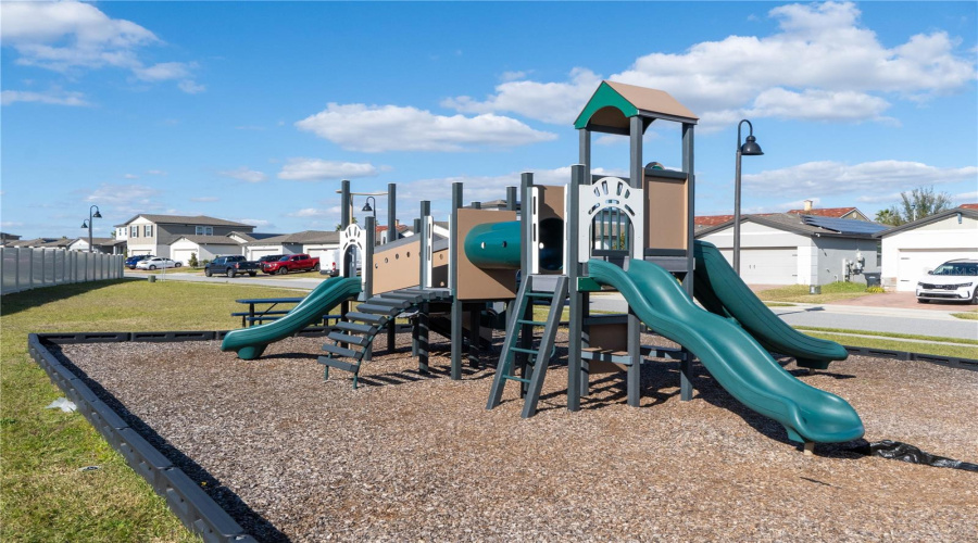 Community playground is right near the pool.