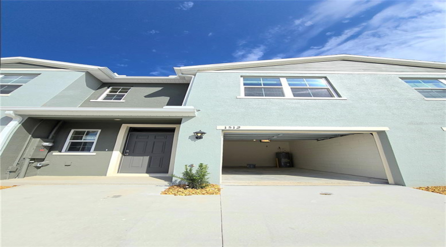 Inviting Entry & Open Garage