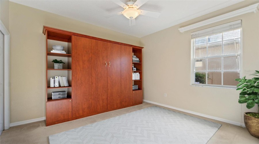 Virtually staged guest bedroom - Murphy bed is real