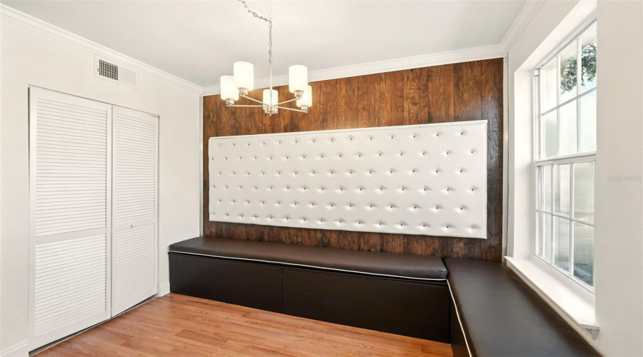 Dining Area With Padded Bench Seats and Back rest wall