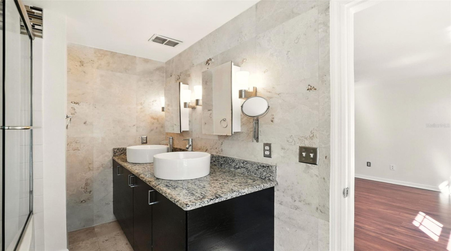Primary Bathroom with Double Vanities and Sinks