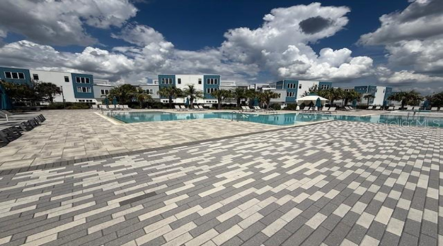 Condo building beyond pool