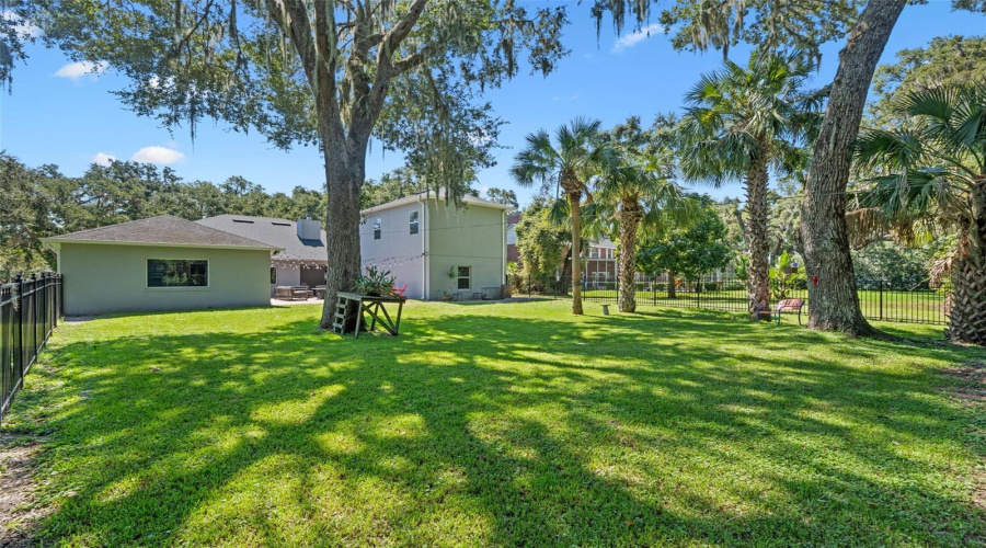 Tucked inside a gated enclave on a 1-acre lot, this hidden gem offers privacy, space, and Southern charm—just moments from Lake Tohopekaliga. With mature trees, quiet streets, and custom homes, Hidden Harbor is where serenity meets style