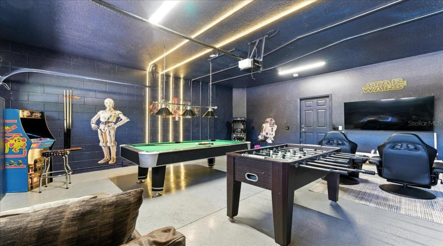 Your vacation headquarters for epic battles—on the pool table or the arcade screen.
