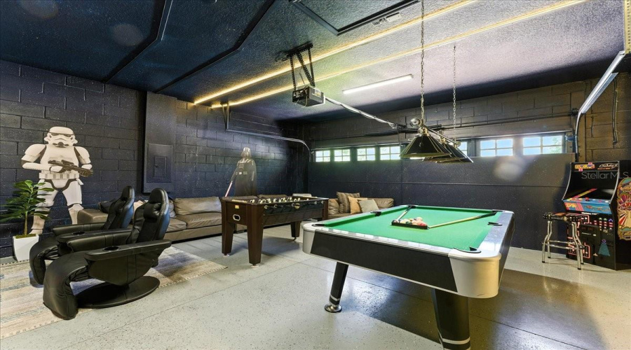 From lightsabers to Pac-Man, this game room takes playtime to hyperspace.