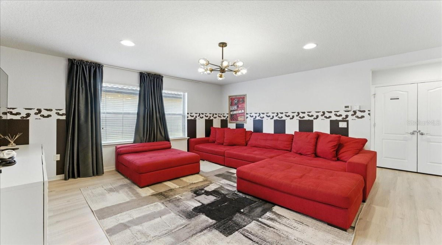 Bright upstairs hangout that keeps guests entertained between park days.