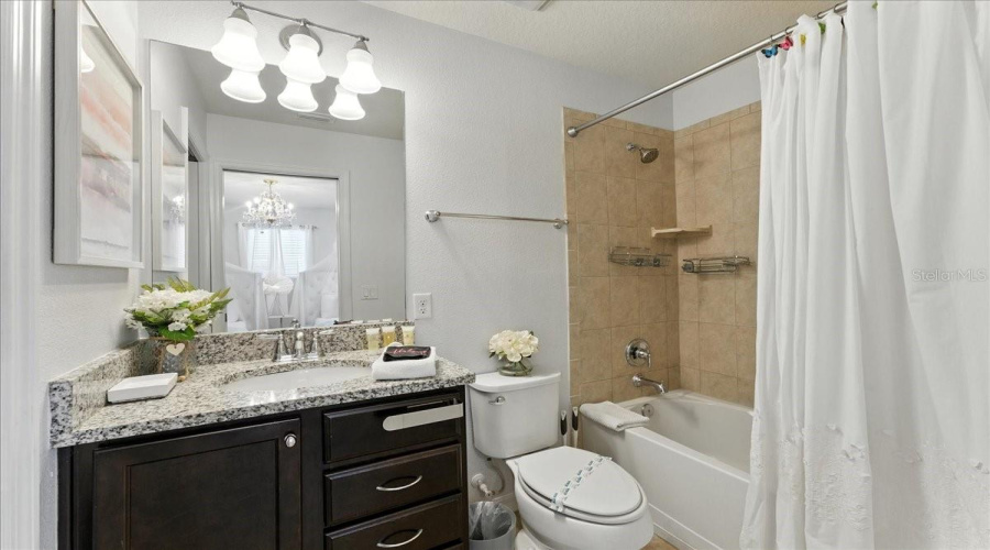 Princess room’s private bath with a tub—easy bedtime rinse, no hallway shuffle.
