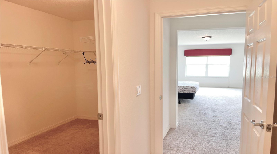 Main bedroom upstairs his & her closets