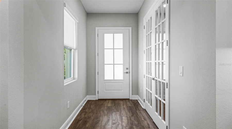 Entry & bonus/office space with french doors